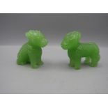Jade? carved dogs/dragons
