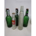 Esso and Shell vintage bottles and3 large Grolsch bottles