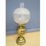 Brass oil lamp with glass shade