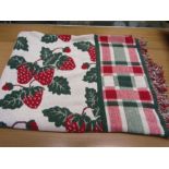 Knitted throw with strawberry design