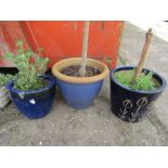 3 blue plant pots