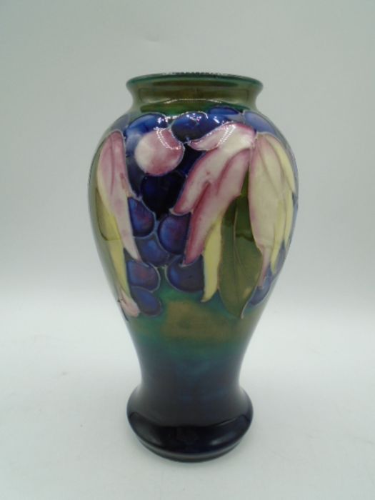 Moorcroft Leaves and Fruit pattern vase, baluster form, the decoration on a graduated olive green to