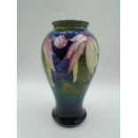 Moorcroft Leaves and Fruit pattern vase, baluster form, the decoration on a graduated olive green to