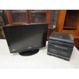 Roadstar stereo record player system and Technika 22" TV/DVD player, both from a house clearance