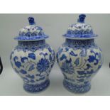 2 blue and white foo dog ginger jars, approx 25cm tall