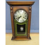 Legend cased clock with key in working order