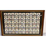 Framed and glazed collection of John Player cigarette cards of RAF badges 51cm x 47cm approx