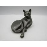 A J. Pecorini stone cat figure the black stone figure in the form of a lounging cat, 12cm L 8cmH