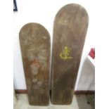 2 wooden surfboards