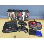 Sega Megadrive 2 console with 14 boxed games (all have manuals), 2 joypads, joystick, all leads