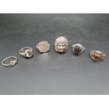 6 silver coloured rings (4 are marked 925) to include a 1916 3d piece ring