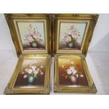 4 oil paintings of flowers in gilt frames