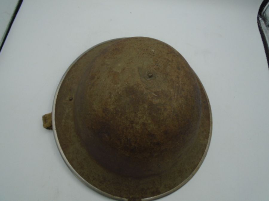 WW2 stamped 1941 mk.II Brodie helmet, plus a British mk. VI helmet C.1950's and a repro hessian - Image 6 of 6