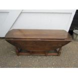 Oak low drop leaf table H48cm W121cm D40cm (when closed) approx