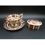 Royal Crown Derby Imari pattern 1128 tea cup and saucer together with a lidded trinket box