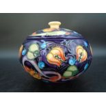 Moorcroft pottery lidded ovoid powder bowl designed by Emma Bossons and decorated with brightly