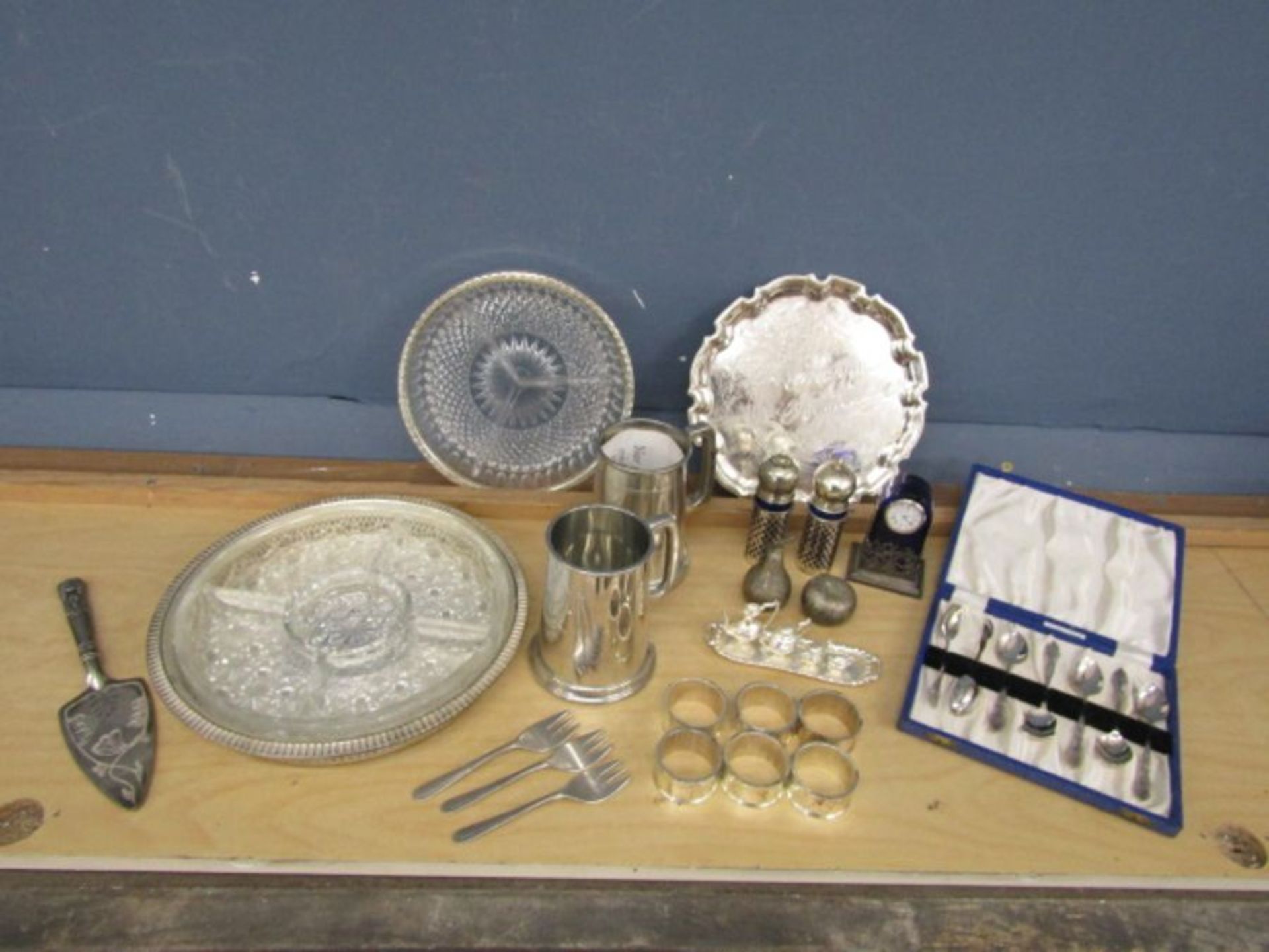 Mixed plated items to include serving dishes, cutlery and salt and pepper shakers etc