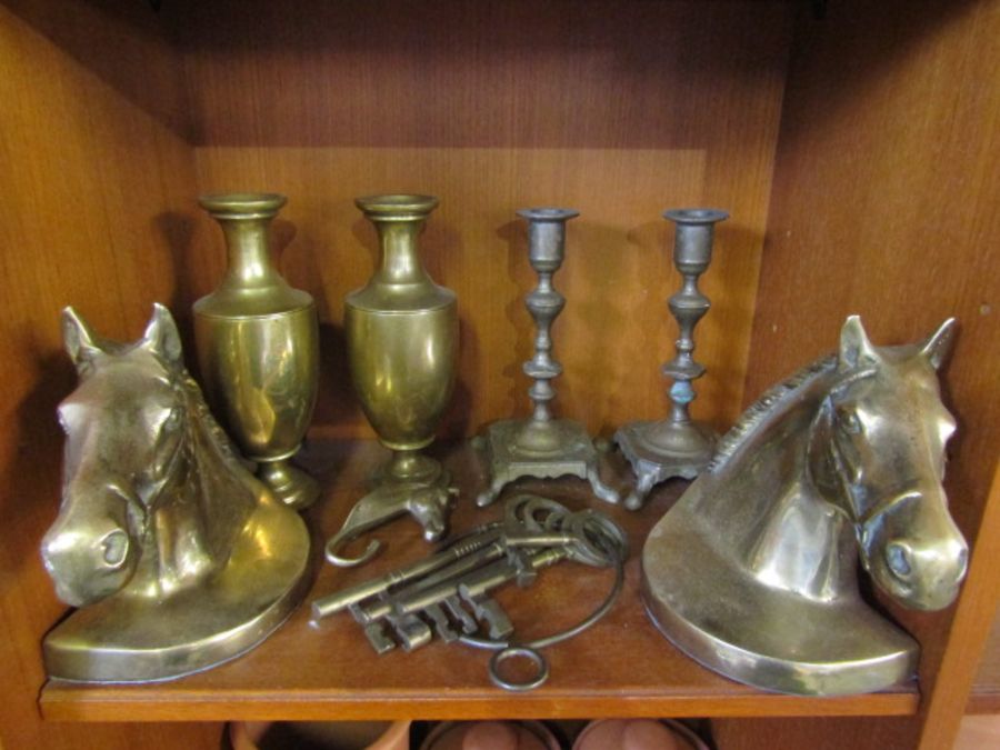 Brass candlesticks, brass vases, brass horse bookends and keys