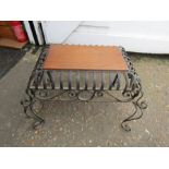 Wrought iron table with wooden top