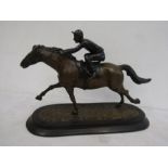 Cold cast Bronze racing horse figure, stamp to base 35cmL24cmH