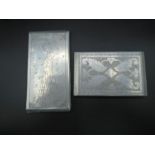 2x WW2 trench art prisoner of war cigarette cases made from aircraft aluminium - one etched with