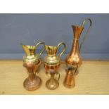 6 Copper jugs