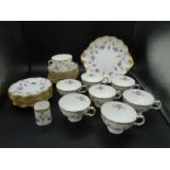 Royal Crown Derby part tea service in the Royal Antoinette A1225 pattern comprising of 8 cups, 8