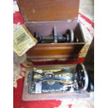 2 vintage sewing machines in wooden cases, one has no key
