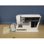 New Home electric sewing machine in case (plug removed)