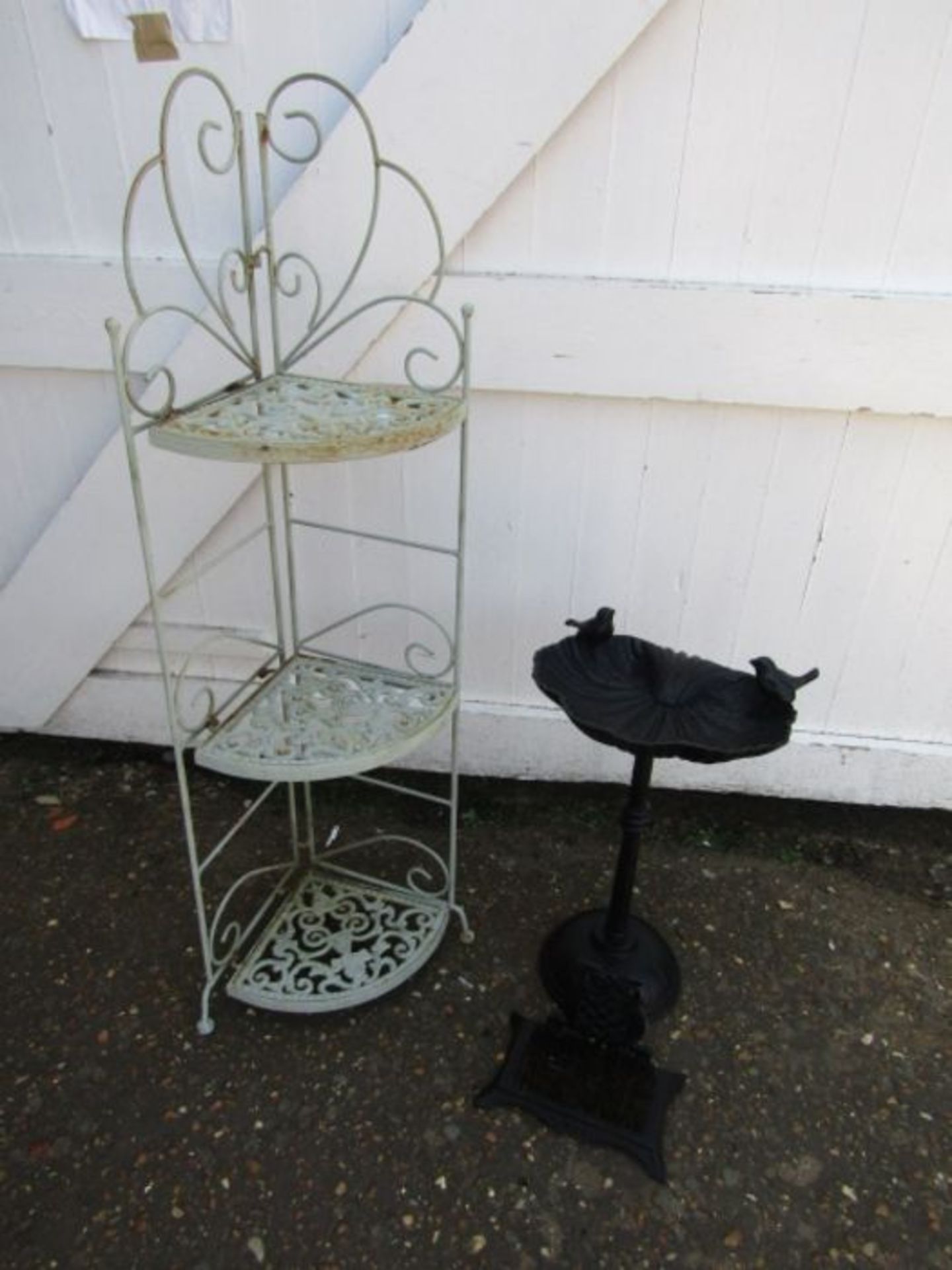 Green metal corner garden shelving, cast iron bird bath and owl boot brush