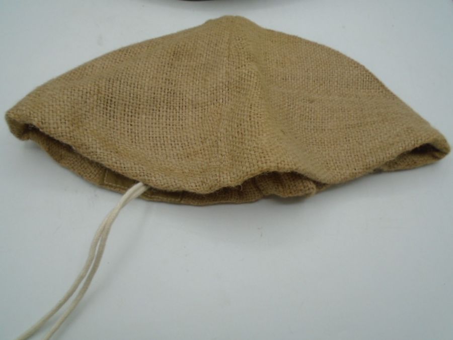 WW2 stamped 1941 mk.II Brodie helmet, plus a British mk. VI helmet C.1950's and a repro hessian - Image 5 of 6