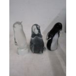 3 glass penguins one has broken beak