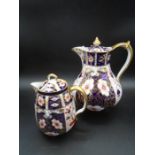 2 Royal Crown Derby Imari pattern 2451 lidded jugs the larger jug had the lid sellotaped on and when