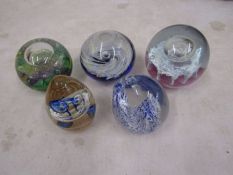 5 dump style paperweights