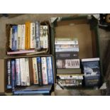 War related books in 2 boxes along with video and DVD boxsets in relation