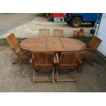 Teak extending garden table with 6 chairs