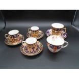 3 Royal Crown Derby Imari coffee cans and saucers plus 2 teacups and one saucer, a/f