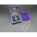 A silver '925' bracelet and a boxed sterling silver necklace by Ortak Scotland