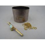 9ct gold necklace ( broken 1.27gms) brooch- poss gold, hallmarks and stamps worn and a silver napkin