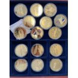 A set of 15 medallions 'History of aviation' in a wooden box.