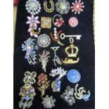 A collection of brooches