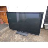 Panasonic Viera 65" LCD TV with remote from a house clearance