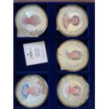 A set of 5 silver and gold plated medaillions (70mm) 'The Queen' in a box