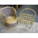 a childs wicker chair and a bamboo magazine rack