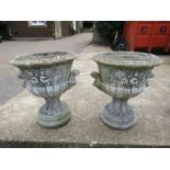 Pair of concrete garden urns on stands H67cm approx