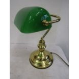 A reproduction bankers lamp