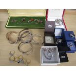 Quantity of mostly silver jewellery   2 boxed rings silver, others white metal, bangles all silver