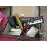 Vintage suitcase containing cameras, phones and keyboard etc
