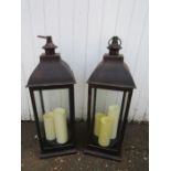 A pair lanterns with candles 74cmH battery operated