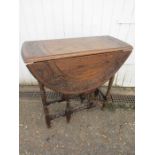 Small carved gate leg table